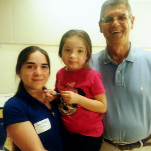 This is Anna and Ruth with J.R., one of our Food Pantry volunteers who regularly prays for and with our guests.